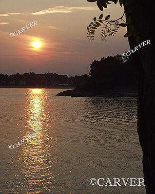 Fire on the Water
In this scene from Lynch Park in Beverly, MA the searing August sky has been 
colored orange by the smoke from distant wildfires burning in Canada.
Keywords: Beverly; sun; Lynch Park; beach; ocean; photograph; picture; print