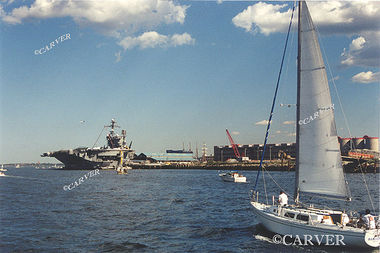 Sailng to a Large Horizon
The aircraft carrier "JFK" occupies the horizon of this sailboat on Boston Harbor.
Keywords: aircraft; carrier; JFK; Boston; sailboat; photograph; picture