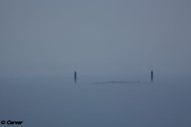 Up and Out of the Fog
The twin lighthouses on Thachers Island are the only sights above a summer afternoon fog stretching north from Gloucester to Rockport. 
